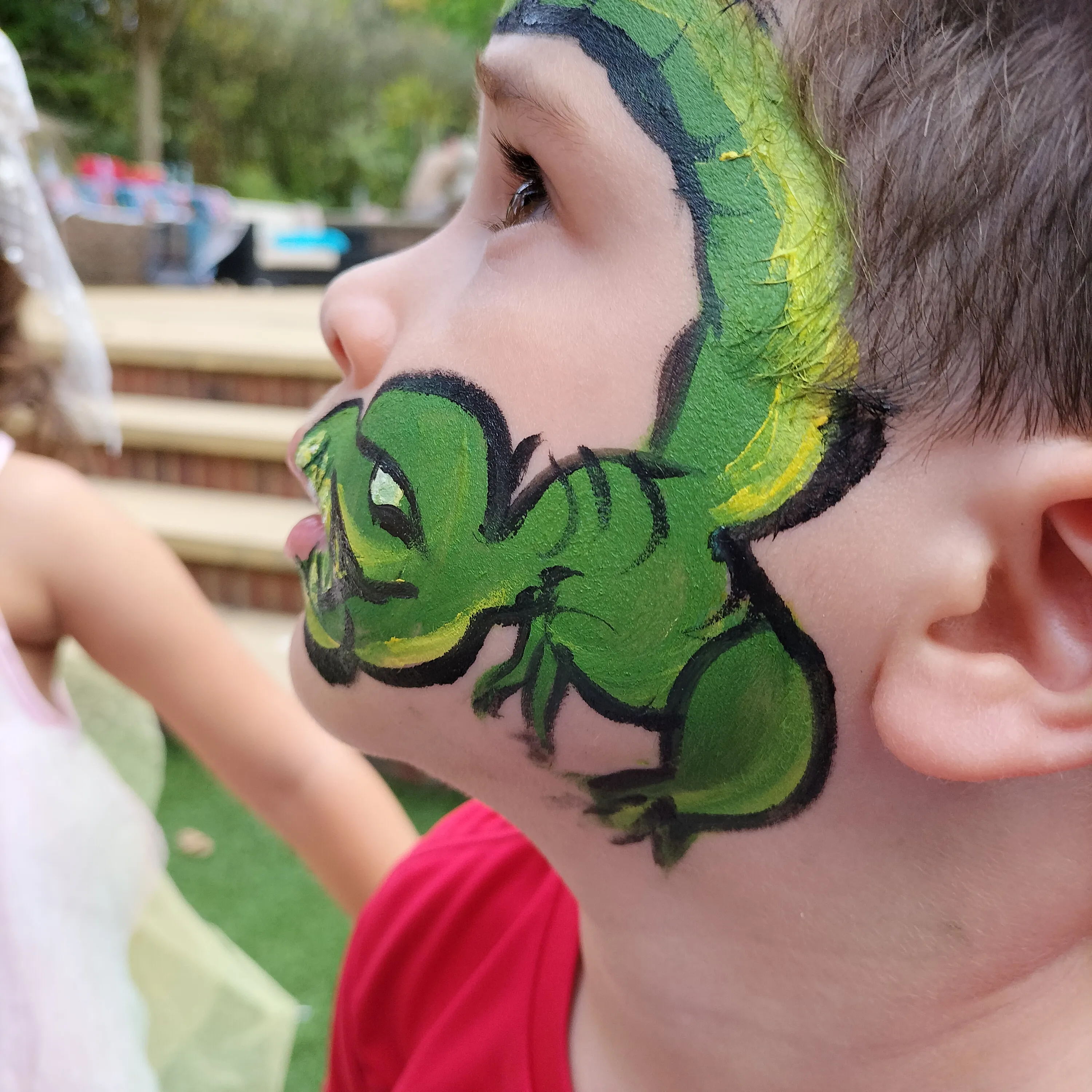 A guest with face paint at one of Anna's events